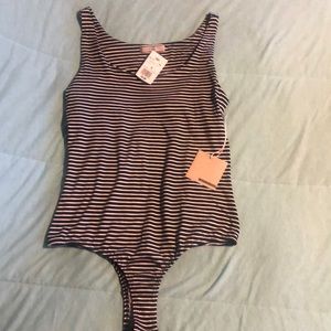 Black and white strip body suit